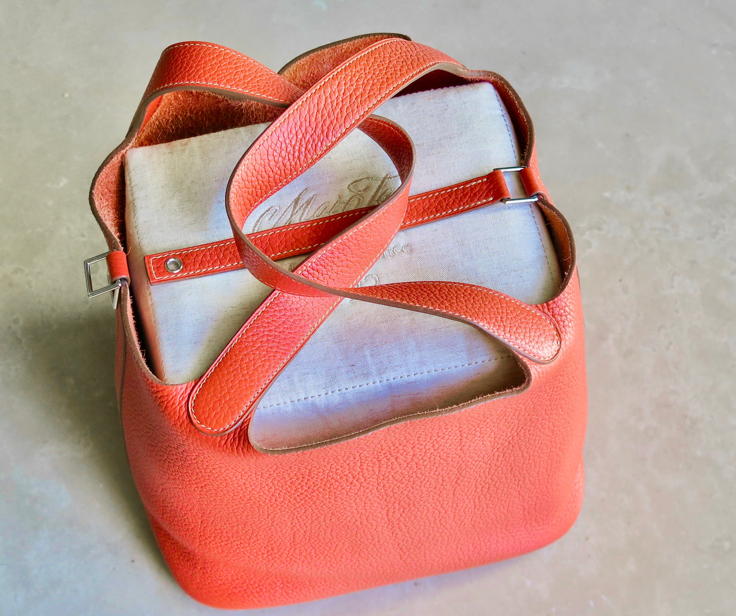 Orange Hermès Picotin with MaiTai bag pillow supporting its shape