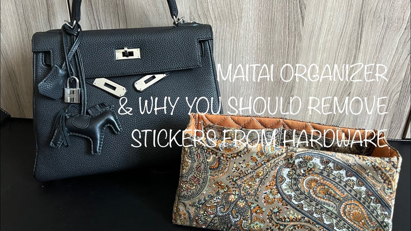 youtube thumbnail showing a maitai bag organizer insert etro gold in front of an hermes bag