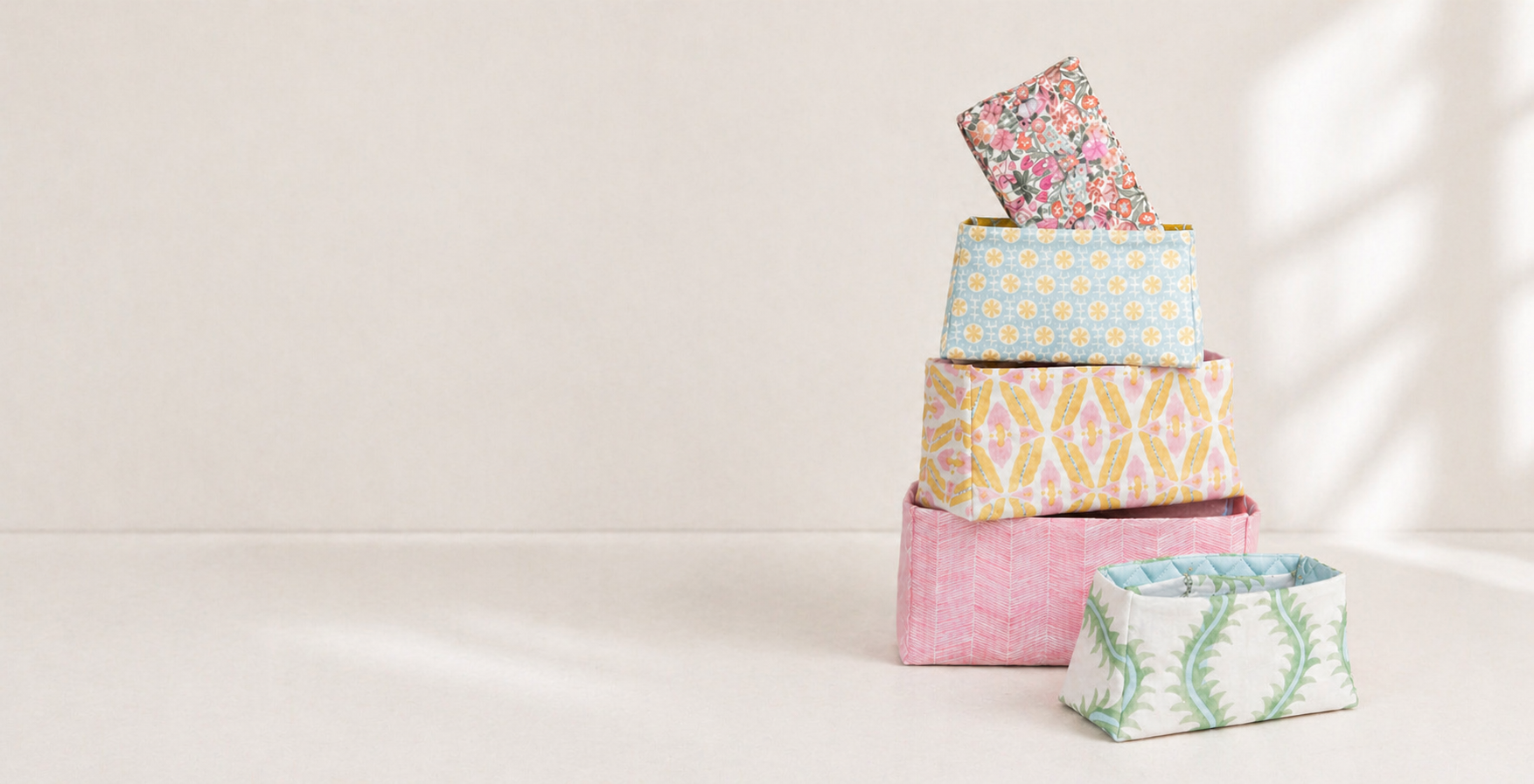 Handcrafted MaiTai bag inserts stacked in pastel designer fabrics